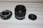 Nikon Nikkor 2.0/28 mm lens with TC-16A AF teleconverter 1.6 x