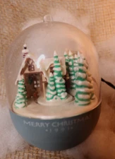 VTG Hallmark Light and Motion Bringing Home The Tree 1991 Plug In Tree Ornament