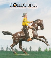 BRITAINS - VINTAGE LEAD COWBOY - MOUNTED ON HORSE WITH BASE - YELLOW SHIRT 1054