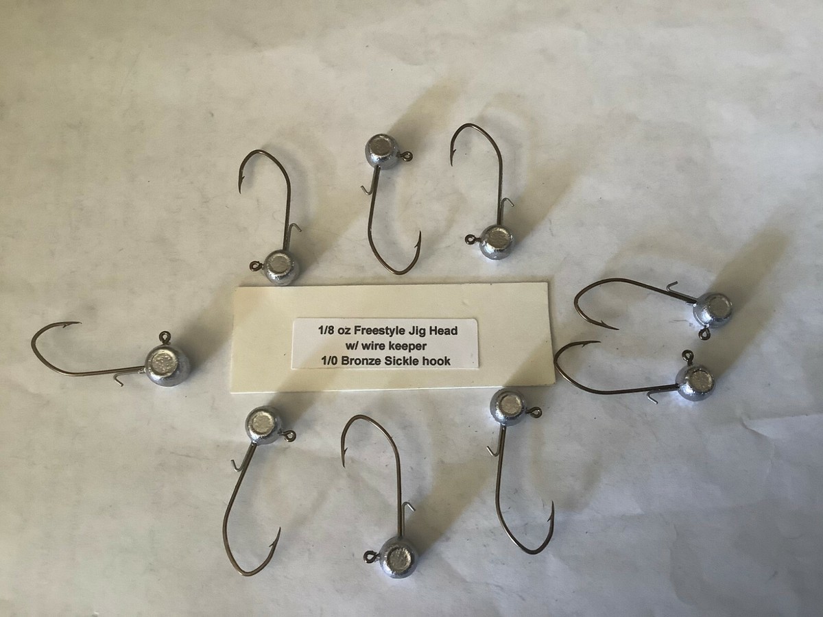 25 Hand made 1/8oz w/ keeper freestyle jig heads with a 1/0 bronze sickle hooks 25 Hand made 1/8oz w/ keeper freestyle jig heads with a 1/0 bronze sickle hooks