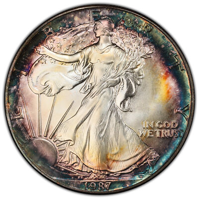 1987 Rainbow Toned American $1 Silver Eagle 1 oz. Fine 999 PCGS