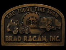 JH25162 VINTAGE 1970s BRAD RAGAN INC THE TOUGH TIRE TEAM BRASSTONE BUCKLE