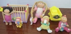 7 vintage Cabbage Patch Kids PVC toddlers. babies, playpen and cradle