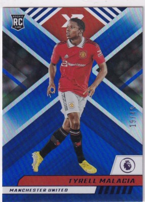 Panini Chronicles 2022-23 PL XR No. 120 Tyrell Malacia Blue 19/49 Rookie