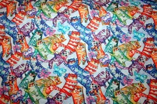 MASSED SUNSHINE CATS 0N BLUE FROM BENARTEX - 100 COTTON FABRIC