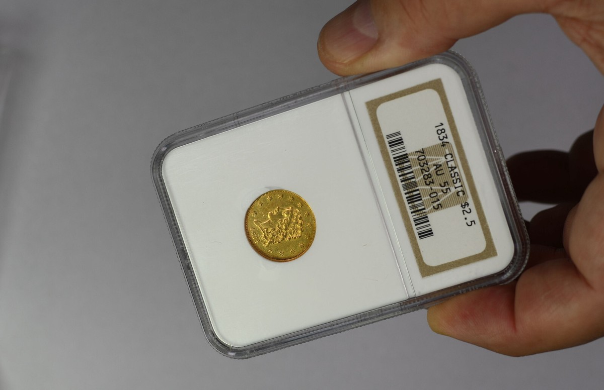 1834 $2.50 Gold Coin NGC graded AU55 Classic head, free