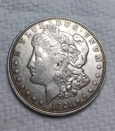 1921 D Morgan Silver Dollar. Est About Uncirculated 55/58 Die Breaks. Video M018