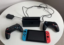 Nintendo Switch Plus Two Handheld Controllers