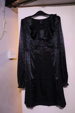 silky black dress with heart patter size 8 new with tags