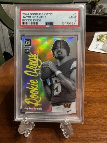 JAYDEN DANIELS 2024 DONRUSS OPTIC ROOKIE KINGS #2 SSP RC PSA 9