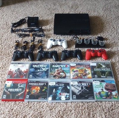 Sony PlayStation 3 Slim 160 GB  w/5 Controllers, 10 Games, HDMI, Cords, and Dock