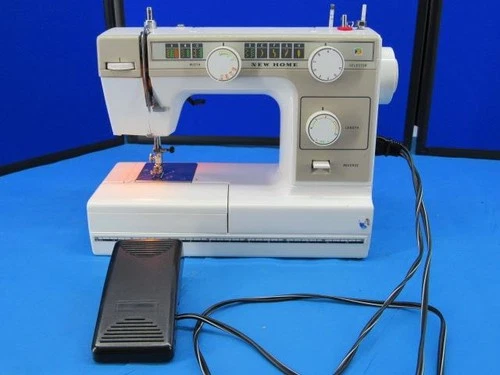 NEW HOME MODEL L-372 DOMESTIC SEWING MACHINE WITH FOOT PEDAL USED
