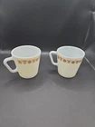 VINTAGE PYREX BUTTERFLY GOLD YELLOW D HANDLE COFFEE MUG CUP 1410 MILK GLASS’S