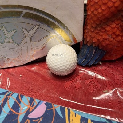 Dunlop DDH golf ball featuring a ''3'' marking.