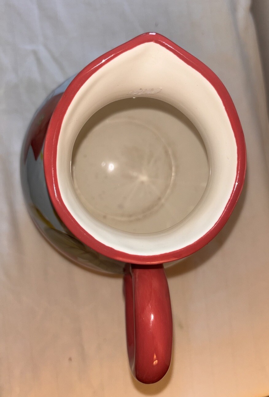 Beautiful Collectible Harry and David Blue with Red Flowers Ceramic Pitcher. 7”