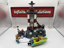 LEGO Scooby-Doo 75903 Faro Infestato Shaggy, Daphne e Scooby Doo