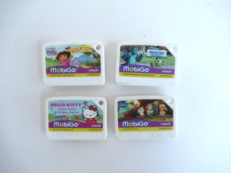 Lot Of 4 Vtech MobiGo Games  Jake & Pirates, Monster University Dora Hello Kitty - Image 2 of 2
