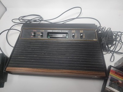 Atari 2600 CONSOLE with 8 games Untested (no controller) frogger, asteroid, etc