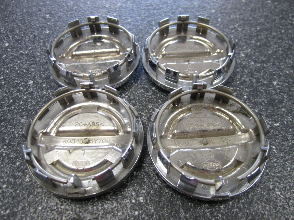 Nissan Chrome Grooved OEM Center Caps 2-1/8 Nissan Chrome Grooved OEM Center Caps 2-1/8