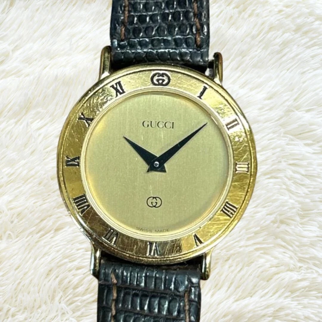 Montre femme GUCCI 3000L cadran doré quartz