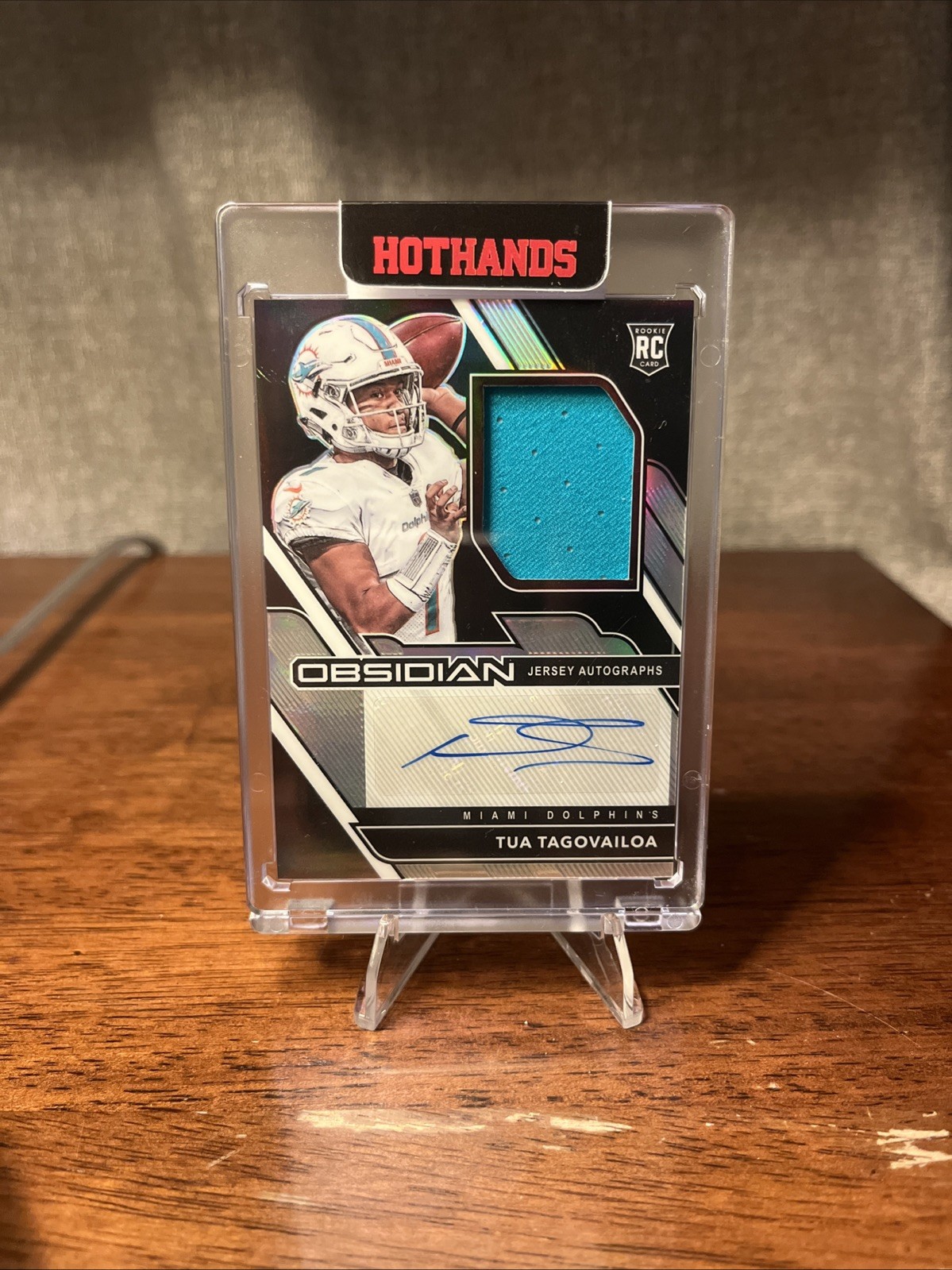 2020 Panini Obsidian - Rookie Jersey Auto Tua Tagovailoa #203 /100 (AU, MEM, RC)