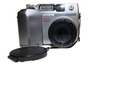 Olympus CAMEDIA C-4000 Zoom Digital Camera 3X Optical Zoom Silver- Turns On