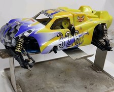 Duratrax Nitro Evader ROLLER 1:10 Nitro 2WD Off-Road Truck Yellow Purple Blue