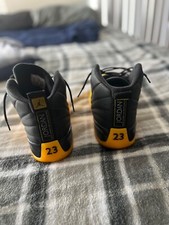 jordan 12 retro black university gold