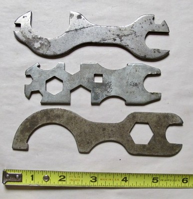 Three different antique bicycle toolbag multi tools/wrenches