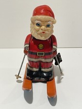 Vintage Santa Claus Wind Up Skiing Works Great Moves w/ Wheels 1950  s Japan RARE