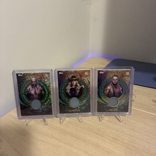 Lot Of  /199 Relics From WWE Topps Universe! Batista,Trish Stratus, Bo Dallas.