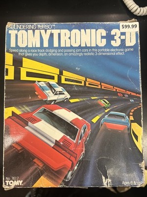 Vintage Boxed Tomy Tronic 3-D Thundering Turbo handheld game 1983.
