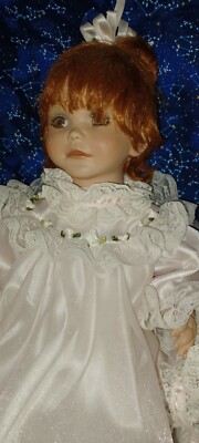 Limited edition Realistic red headed toddler girl doll by Rustie.  41 of 2000