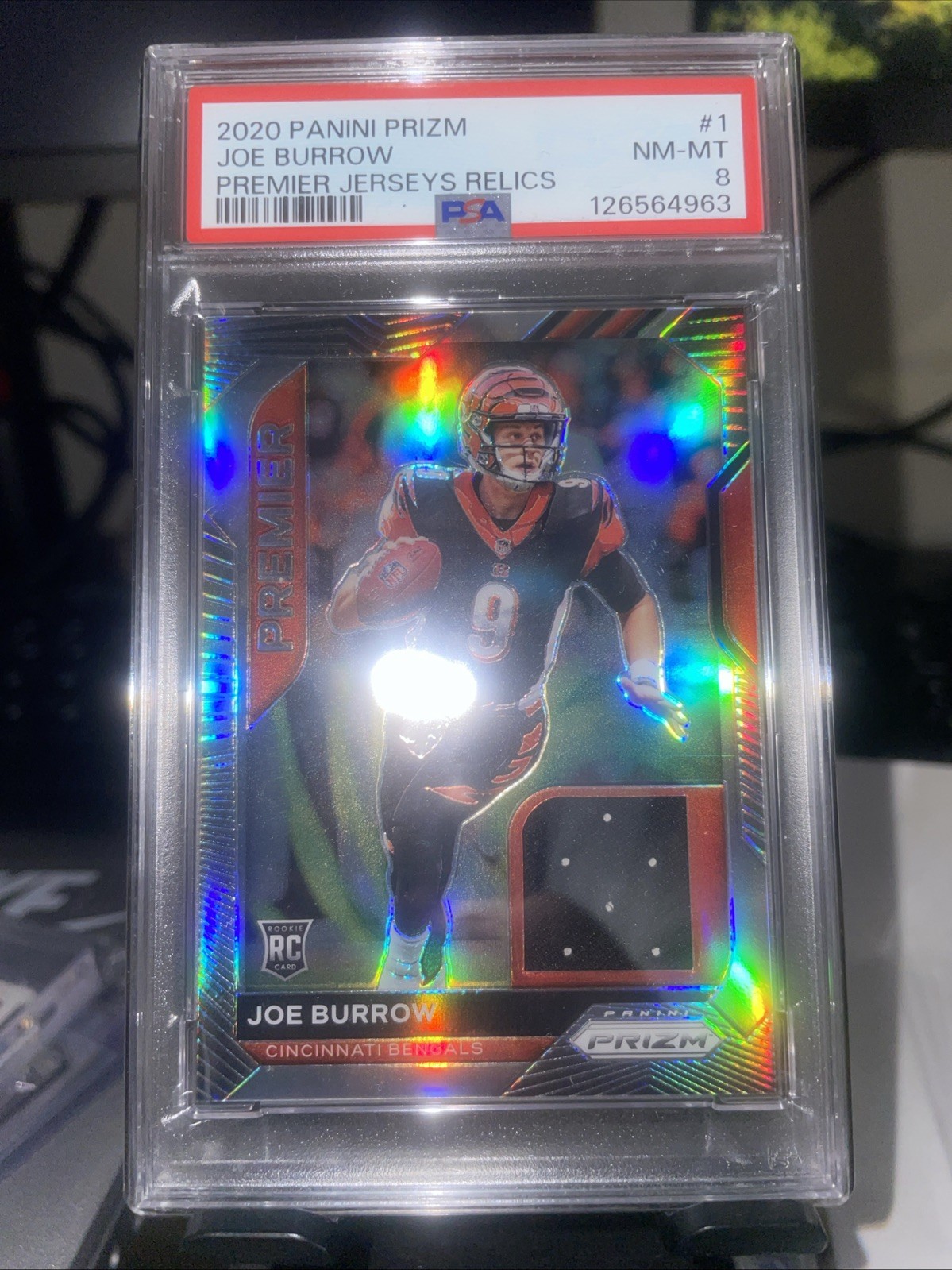 2020 Panini Prizm Joe Burrow Premier RC Jersey Rookie #1 Bengals PSA 8 view 1
