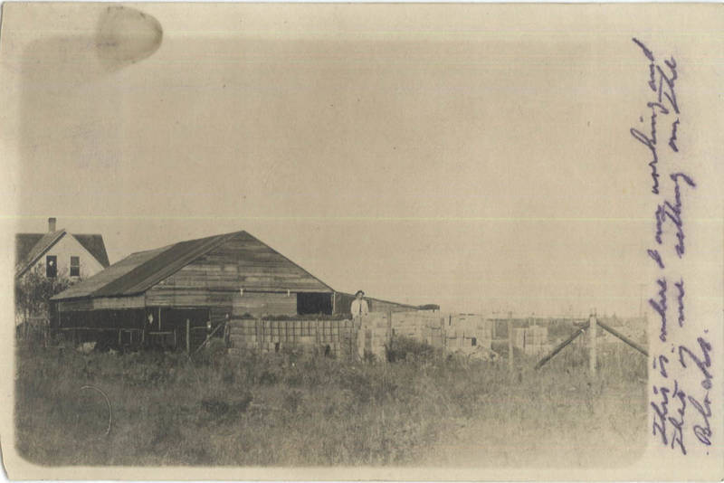 RPPC Hecla,SD Man with Crates,on Farm Brown County South Dakota