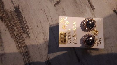 Verkaufe runde Ohrstecker schwarz gold Nickel free Dubai Collection 