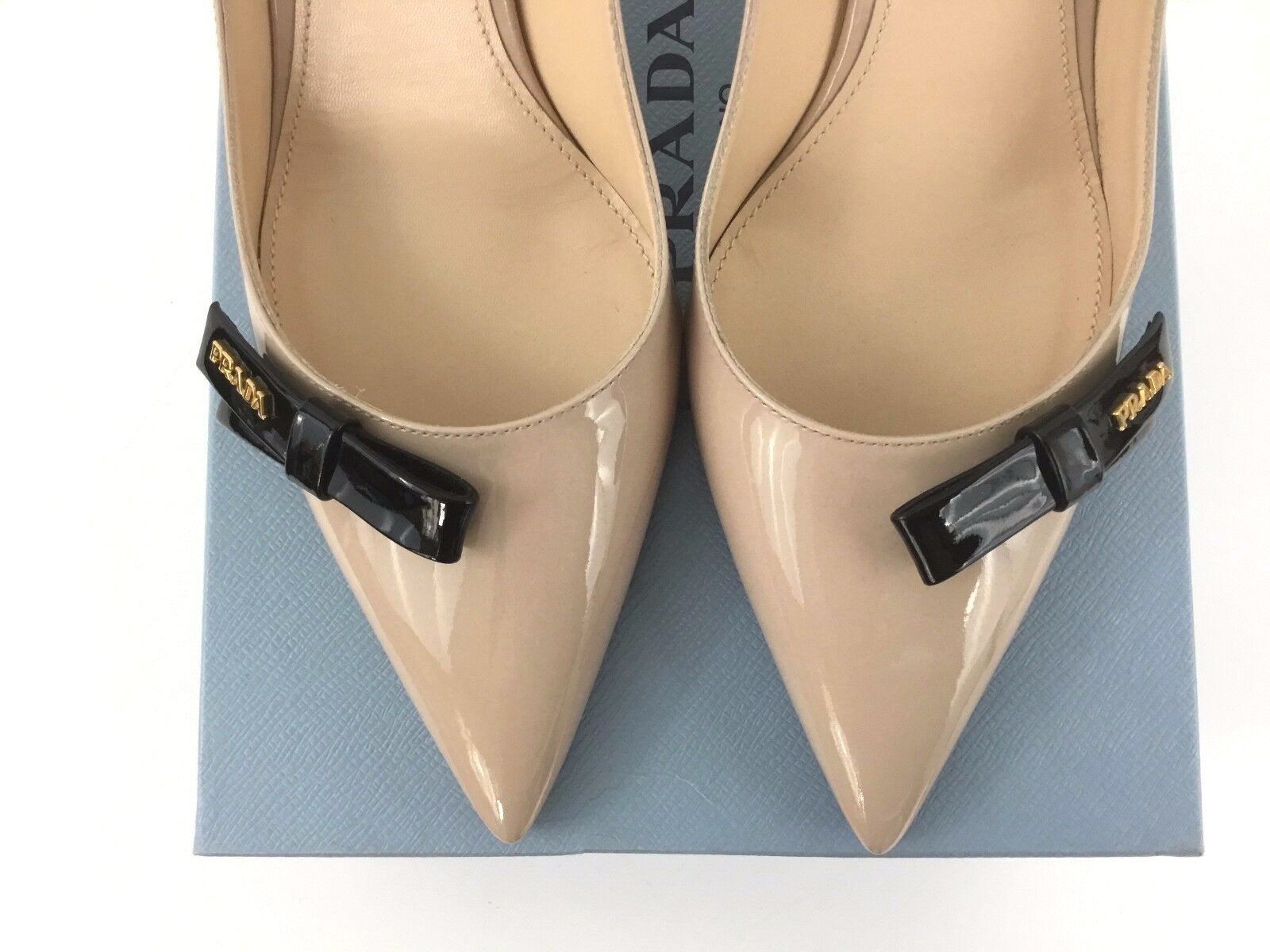 prada logo bow pointy toe pump
