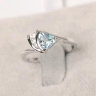 1ct Lab-Created Aquamarine Curved Solitaire with Accent Ring White Gold Plated