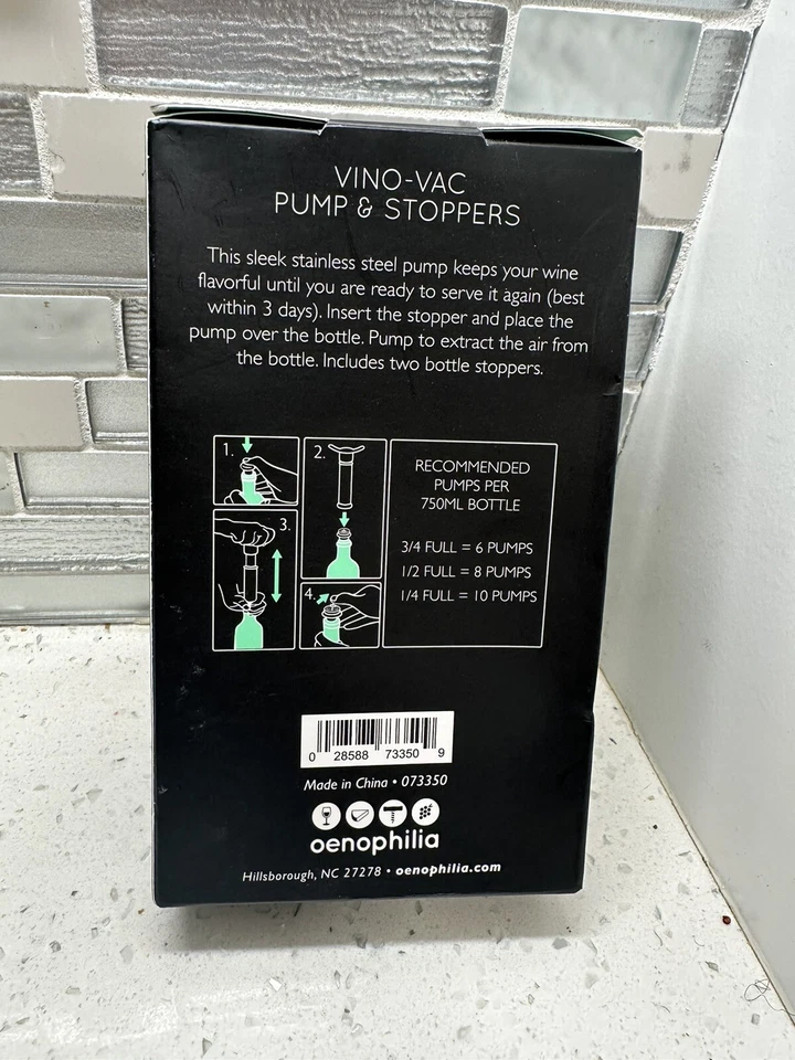 Bomba de vacío vintage 82 Vino-Vac Wine Saver con 2 tapones de botella reutilizables de acero Foto 2 de 3