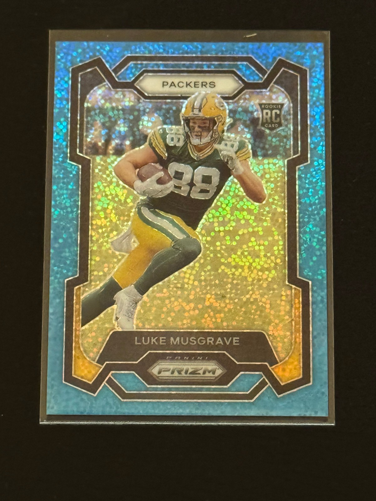 2023 Panini Prizm - Rookies Luke Musgrave #337 Blue Sparkle Prizm /96 (RC)