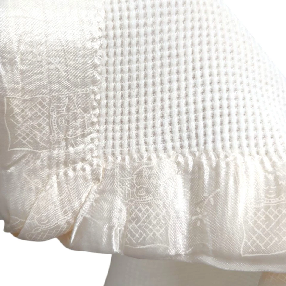 Manta térmica tejida gofre Baby Gordon de colección con adornos de nailon Orlon blanco roto Foto 2 de 4