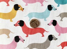 White Polycotton fabric with Multicoloured Dachshund Dog Print - 1 full metre