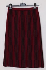 Circa 1975–1985, wool plaid day skirt, A-line structure, small-scale manufacture