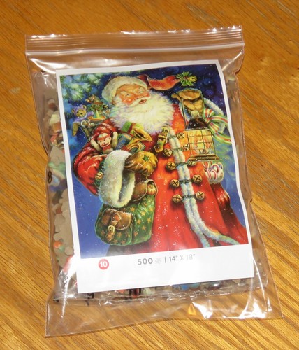 Donna Race Art - St. Nick Lights the Way - Santa Christmas Puzzle - Sealed Bag - Picture 3 of 3