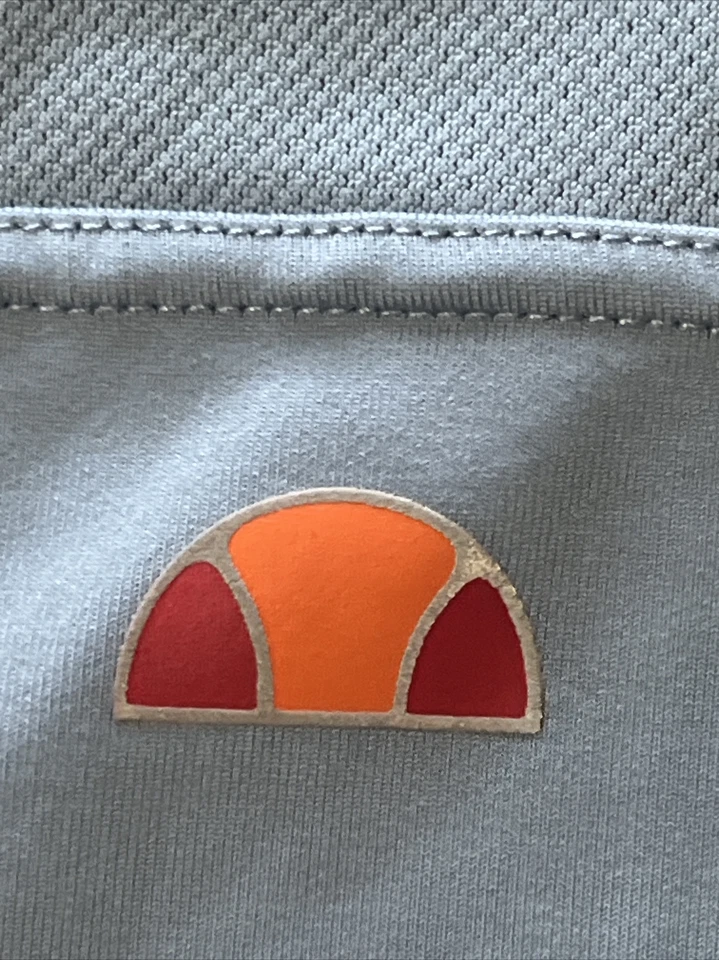 Top deportivo Ellesse para mujer talla 12 azul sin mangas 1/4 cremallera frontal logotipo Foto 3 de 4