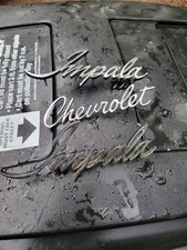 Chevrolet And Impala Car Emblems