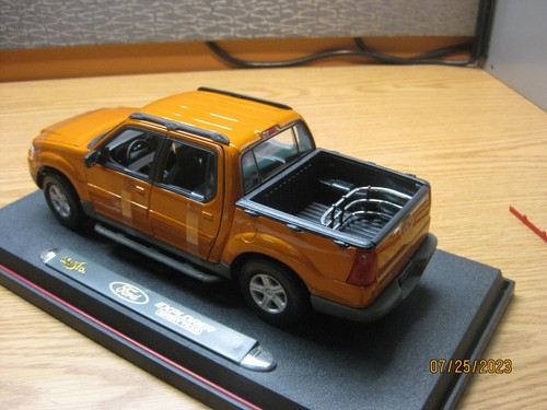 1/18 2002 Ford Explorer Sport Trac in Gold von Maisto # 36891 - Bild 12 von 14