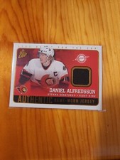 2002-03 PACIFIC QUEST FOR THE CUP DANIEL ALFREDSSON GAME-USED JERSEY #12