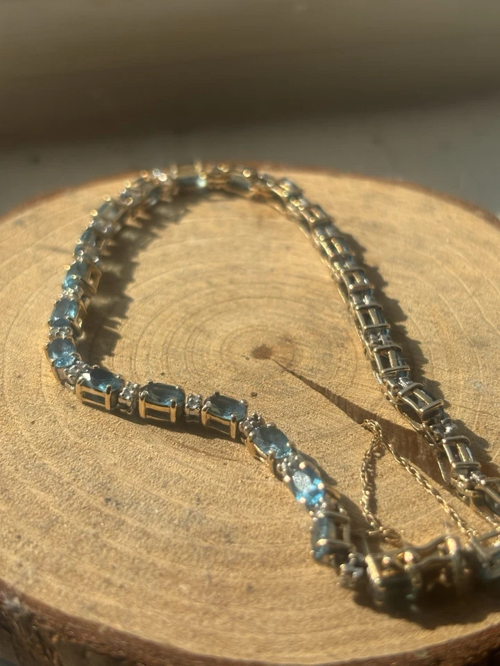 Brazalete tenis topacio azul suizo oro amarillo 14K Foto 2 de 4