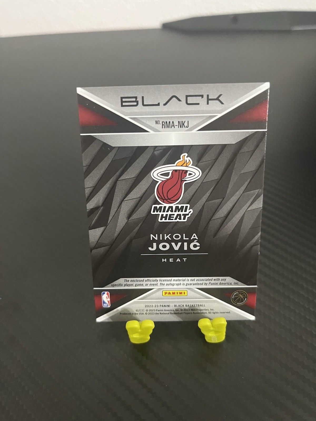 Panini Black 2022-23 Nikola Jović Rookie Patch Auto #RMA-NKJ Heat 20/49 view 2
